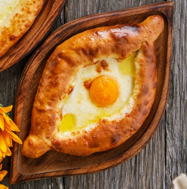 Create meme: Adjara khachapuri, khachapuri in Adjarian style 300 g, Adjara khachapuri