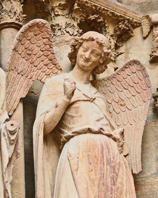 Create meme: smiling angel of Reims Cathedral, Reims Cathedral Archangel Gabriel, The smile of Reims is a smiling angel