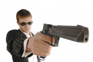 Create meme: holding a gun, the man with the gun, gun