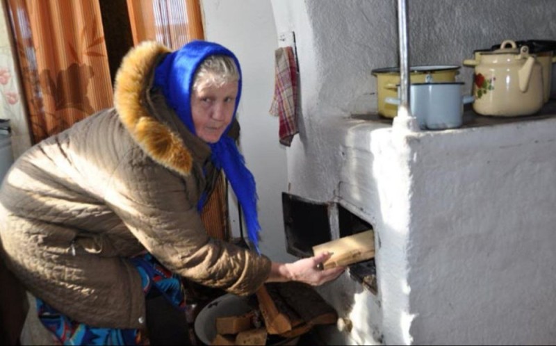 Create meme: rustic oven, stove heating in the village, the grandmother in the village