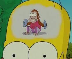 Create meme: Homer Simpson monkey in the head, the monkey from the simpsons with plates, the monkey in the head of Homer