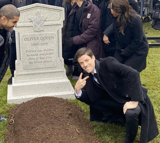 Create meme: grave , Grant Gustin at Oliver Queen's grave, grant gastin near the grave