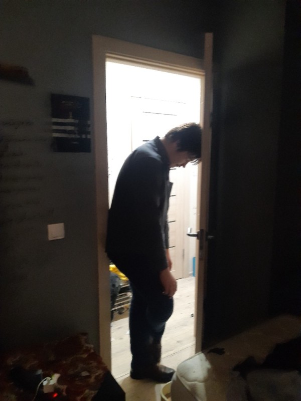 Create meme: guy , installing the door, feet 