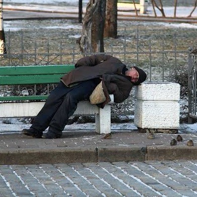 Create meme: a homeless person sleeps , homeless man on the bench, the bum on the bench