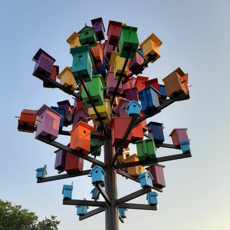 Create meme: Yoshkar-ola birdhouse art object, lots of birdhouses, There are many birdhouses on the tree