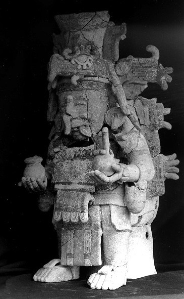 Create meme: Chuck is the god of Maya, statue of Coatlicue Azteca, sculpture of the Aztec goddess Coatlicue