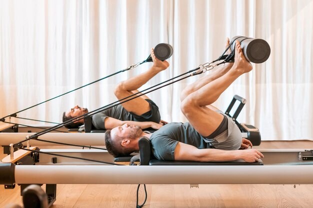 Создать мем: пилатес тренировка, reformer pilates, пилатес тренажер