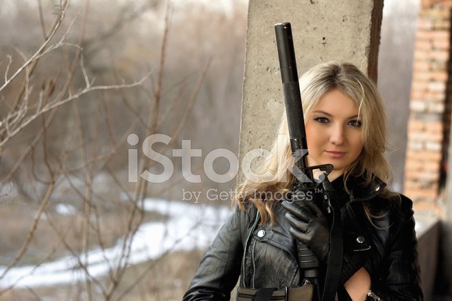 Create meme: a girl in a leather jacket with a gun, girl with a gun, beautiful girl with a gun
