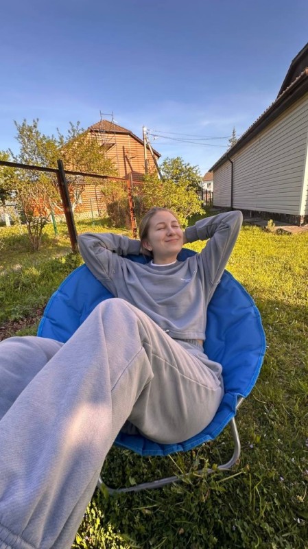 Create meme: girl , hanging chair, rattan hanging chair