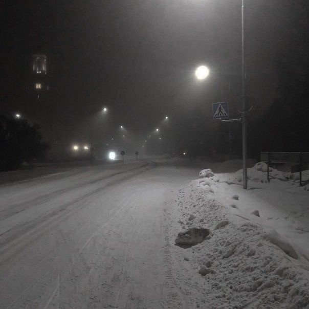 Create meme: winter road at night, Snow is falling, winter night