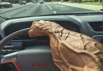 Create meme: slicing, a pumped-up hand behind the wheel, driving