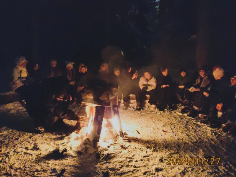 Create meme: people around the campfire, campfire gatherings in the forest, barbecue in nature at night