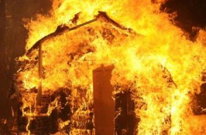 Create meme: caught fire, the house burned down, burning house