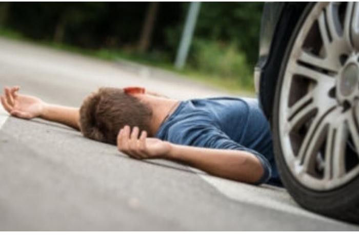 Create meme: a man was hit by a car, Lying on the road, hit by a car