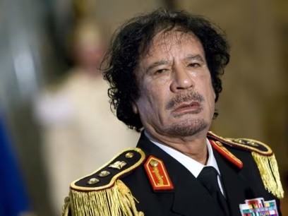 Создать мем: каддафи молодой, каддафи мертв, muammar gaddafi