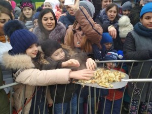 Create meme: carnival and hypermarket, pancakes with a shovel in Stavropol, Carnival