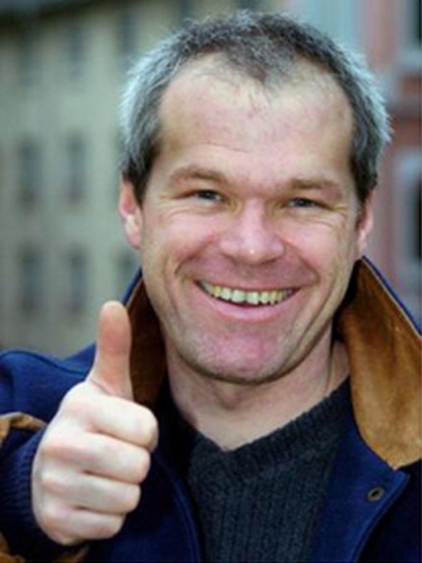 Создать мем: uwe boll art, уве болл улыбается, uwe