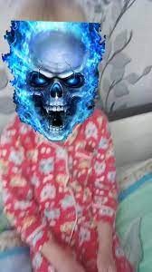 Create meme: flaming skull, blue skull, boy 