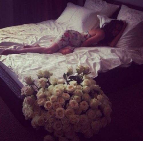 Create meme: Flowers in bed, flowers , girl 