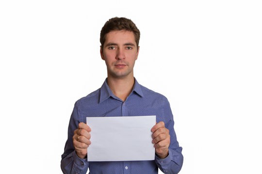 Create meme: a piece of paper in your hands, A man is holding a piece of paper, A man holds a sheet