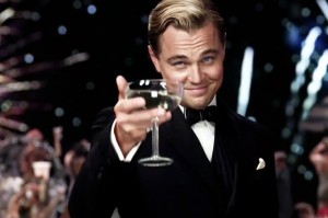 Create meme: a toast to those MEM, the great Gatsby with a glass of, Leonardo DiCaprio with a glass of