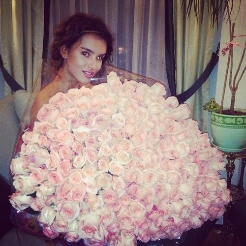Create meme: girl with roses, a gorgeous bouquet, give the girls flowers