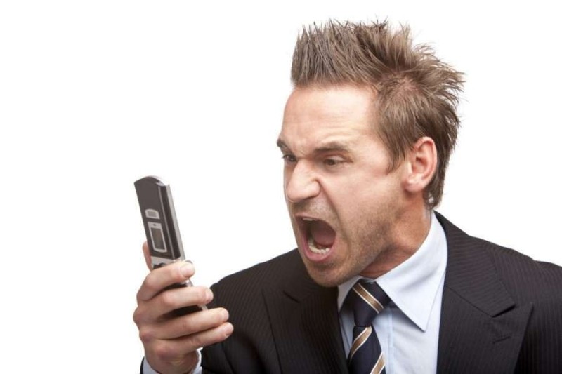 Create meme: dissatisfied man, shouts into the phone, scammers are calling by phone