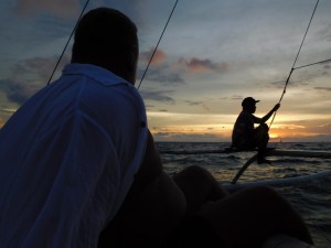 Create meme: spinning at sunset, fisherman silhouette sea, sea fishing pictures
