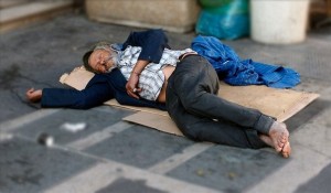 Create meme: homeless, bum lies, a homeless person sleeps