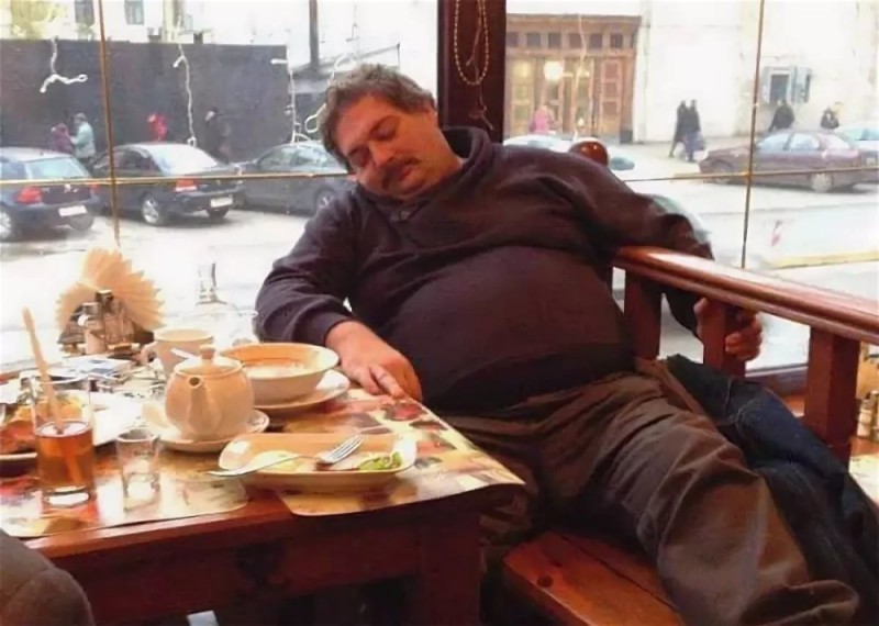 Create meme: Dmitry Bykov in a cafe, male , Dmitry Bykov