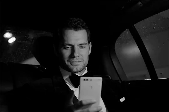 Create meme: Henry Cavill, Henry Cavill with the phone in the car, cavill