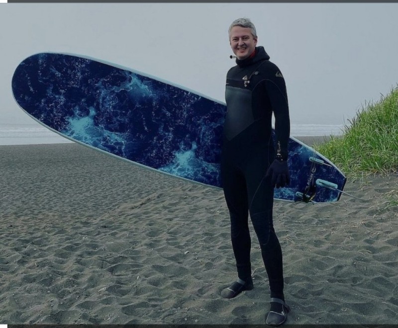 Create meme: surfing, elena zikratova, head of the surfing school "snowave kamchatka", surfer on the wave