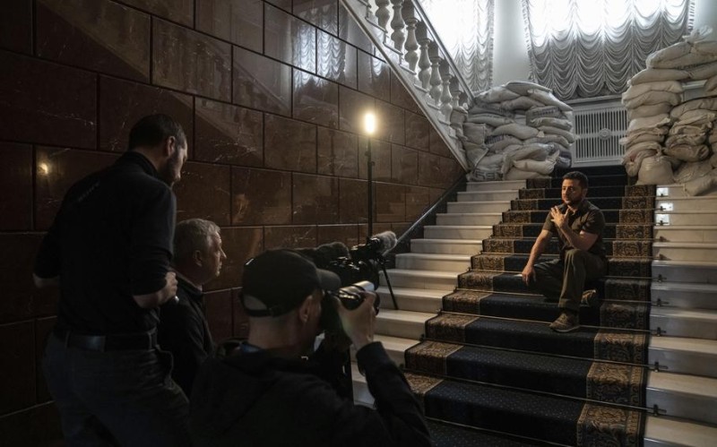 Create meme: The ladder of giants, shooting on the stairs, Zelensky is on the stairs