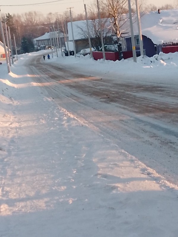 Create meme: snow , the building , the road to Zavodoukovsk