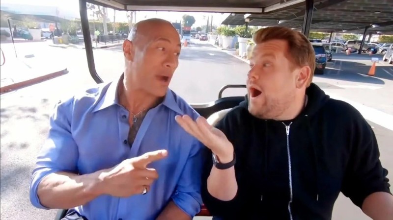 Create meme: Rock Johnson sings in the car, Dwayne Johnson on a golf cart, Rock Johnson rides a car and sings