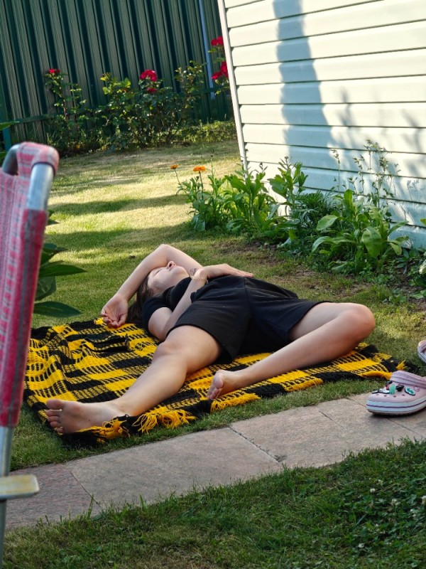 Create meme: a girl in the country, feet , picnic in the park