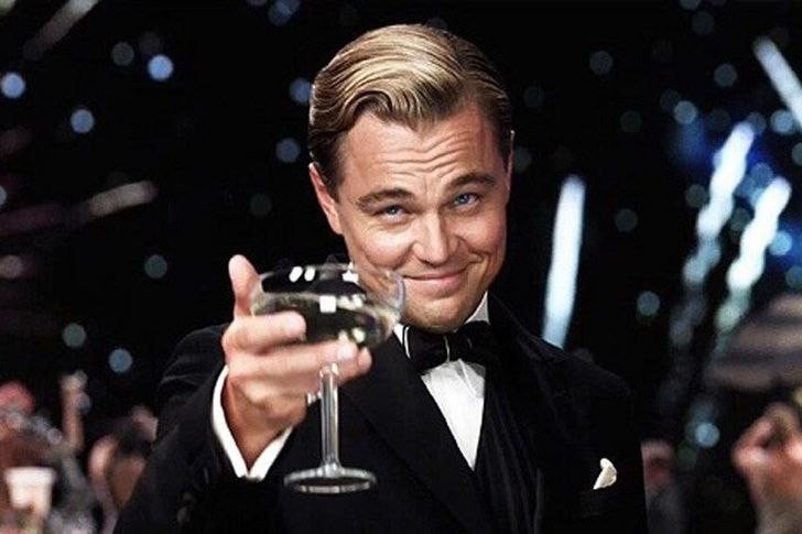 Create meme: Leonardo DiCaprio with a glass of, the great Gatsby Leonardo DiCaprio, DiCaprio with a glass of