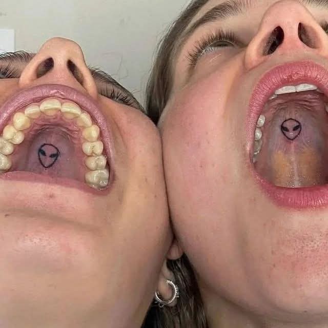 Create meme: tattoo in the mouth, girl , tattoo on the palate in the mouth