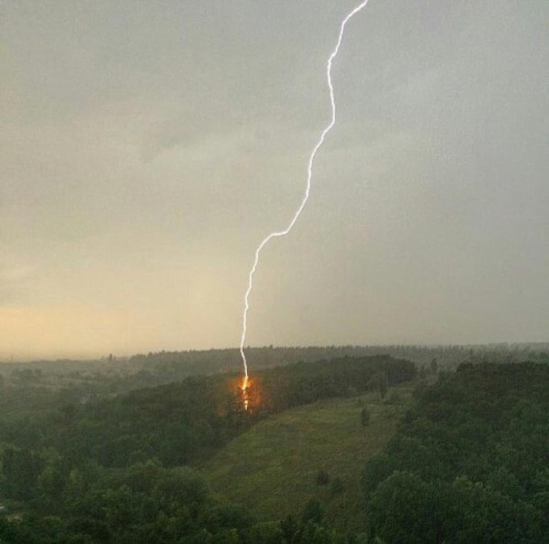 Create meme: lightning struck a house in Khimki, lightning strikes, Lightning in the forest