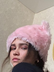 Create meme: pink fur hats, hat, the girl in the hat