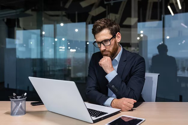 Create meme: people , male , businessman with phone near big office window