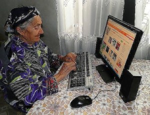 Create meme: pensioner, old black hat, Russian pensioners at the computer