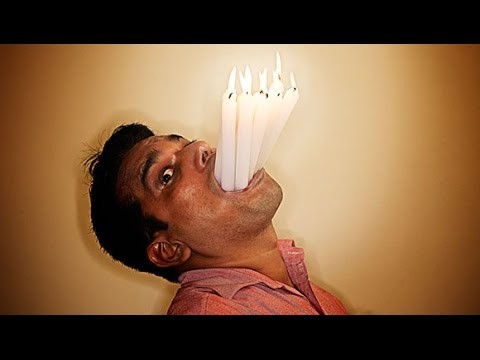 Create meme: funny candles, blows out the candles, blowing out the candles on the cake