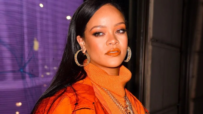 Create meme: Rihanna , Rihanna in orange, singer Rihanna