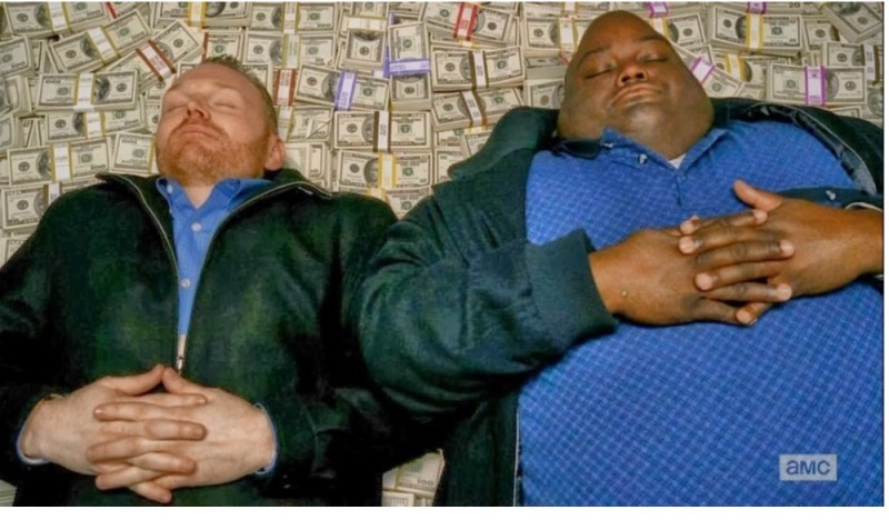 Create meme: the negro is lying on the money, lying on a pile of money, meme the Negro on the money