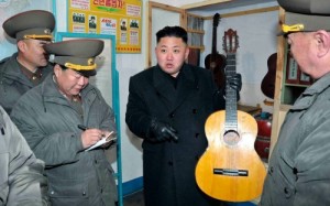 Create meme: Kim Jong-UN with a guitar