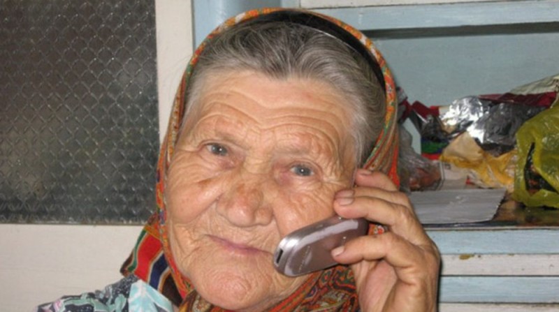 Create meme: grandma with a cell phone, Baba Nyura , grandma with a phone