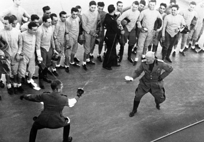 Create meme: Benito Mussolini , mussolini fencing, Mussolini takes the parade