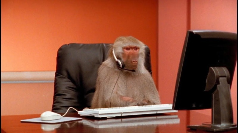 Create meme: computer ape, monkey in the office, monkey behind a computer