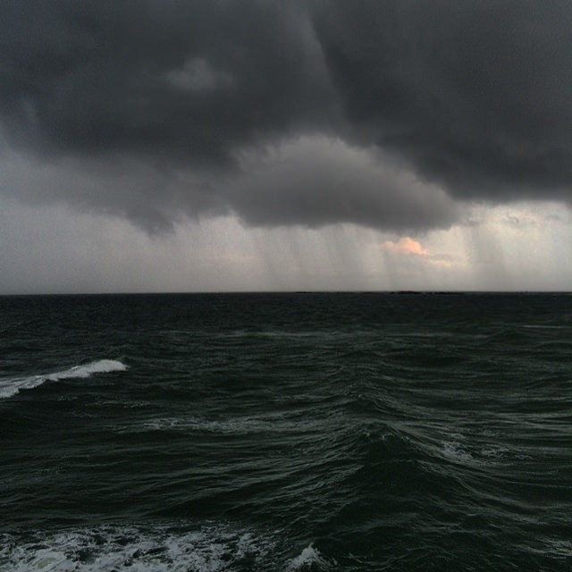 Create meme: cloudy sea, the ocean is dark, storm